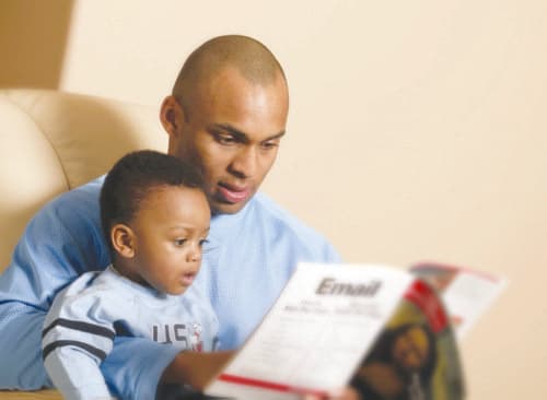 Father reading with his child